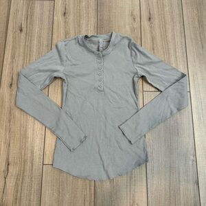Skims long sleeve button up top